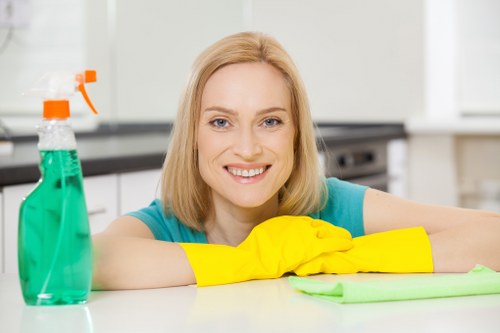 Team following health and safety procedures in a cleaning environment