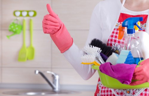 Chiswick cleaner organising a tidy kitchen workspace
